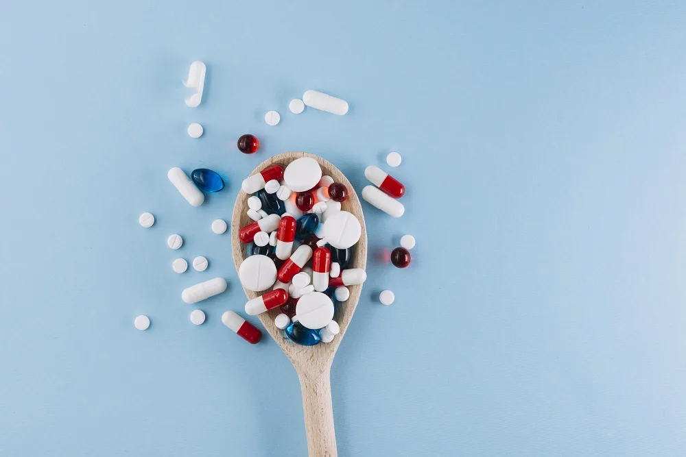 various-pills-wooden-spoon-trump-tariffs