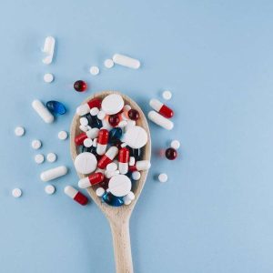 various-pills-wooden-spoon-trump-tariffs